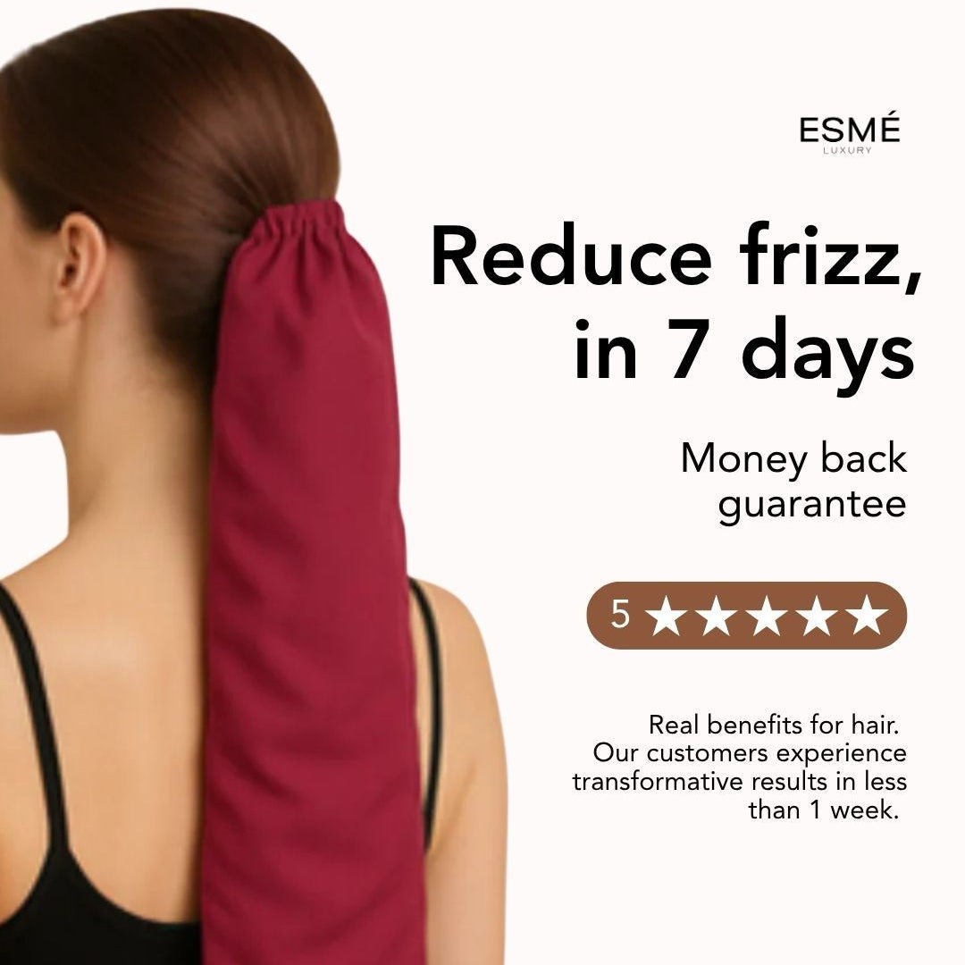 Woman with a red hair tie around her ponytail, Esmé brand advertisement on a white background.