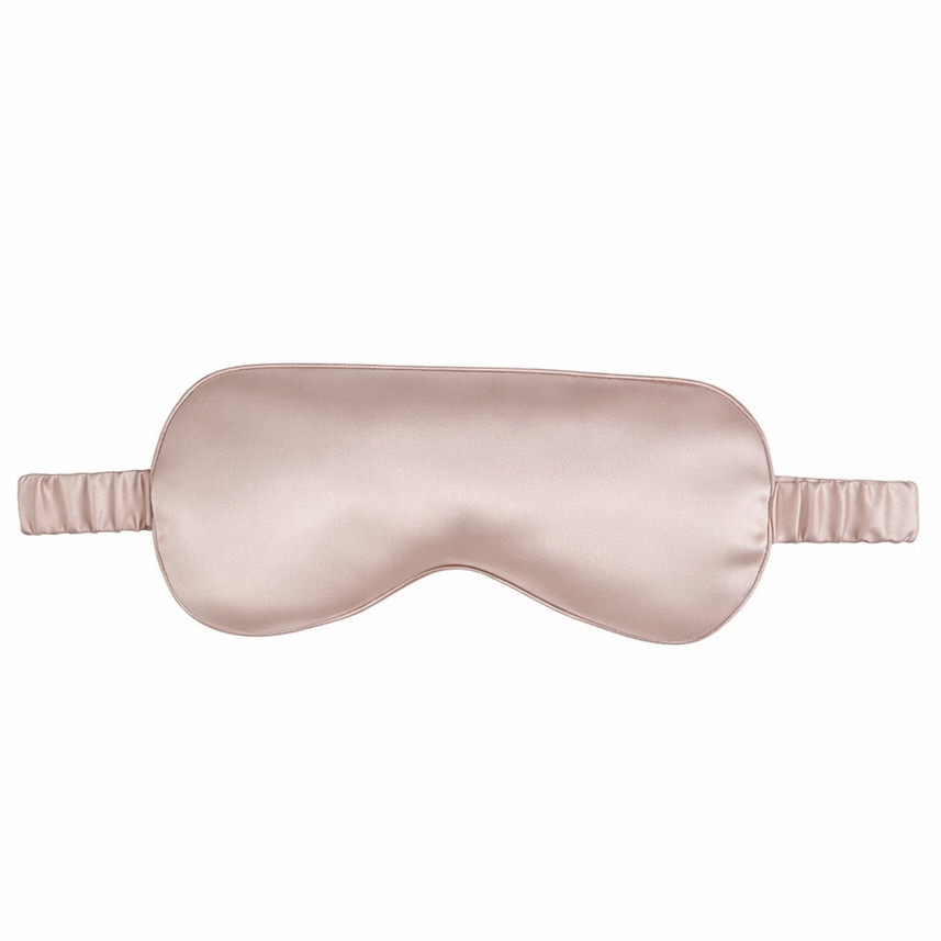Silky sleep mask in pink on a white background